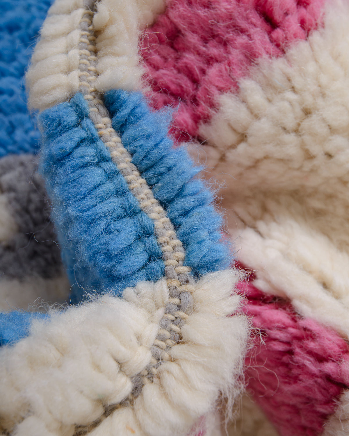 Modern, designer, handcrafted Berber rug from Morocco. Beniourain carpet with beautiful colours and patterns and fluffy wool texture.